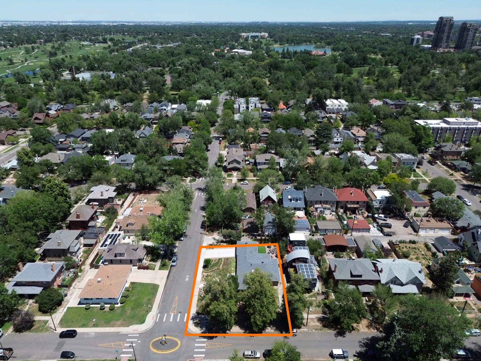 Elevated view of the outlined property looking toward City Park and the lake