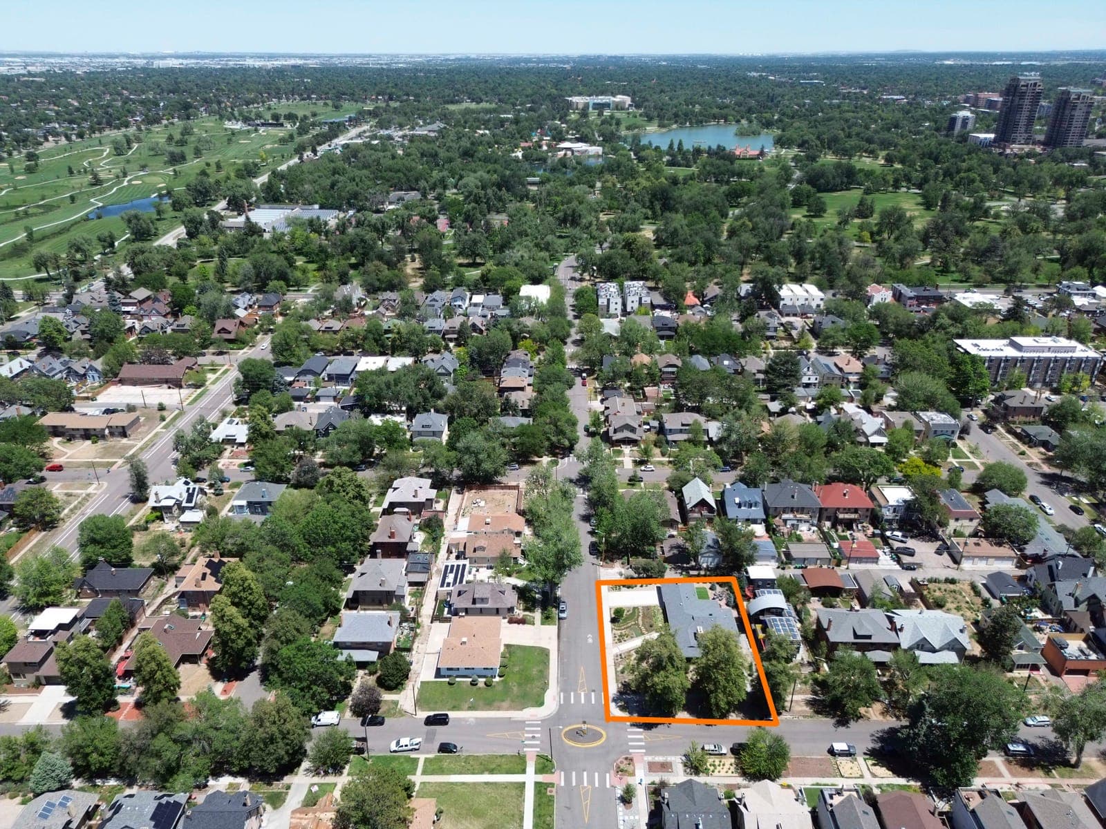 Elevated view of the outlined property with City Park and Ferril Lake beyond